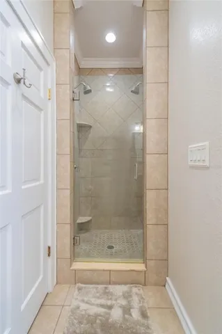 a bedroom with a sink and a window