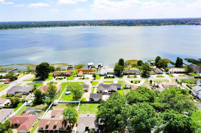 a view of a swimming pool with a patio