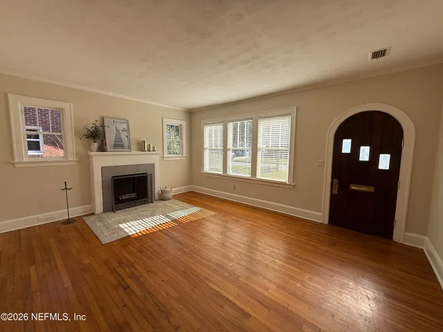 a kitchen with stainless steel appliances a sink stove and cabinets