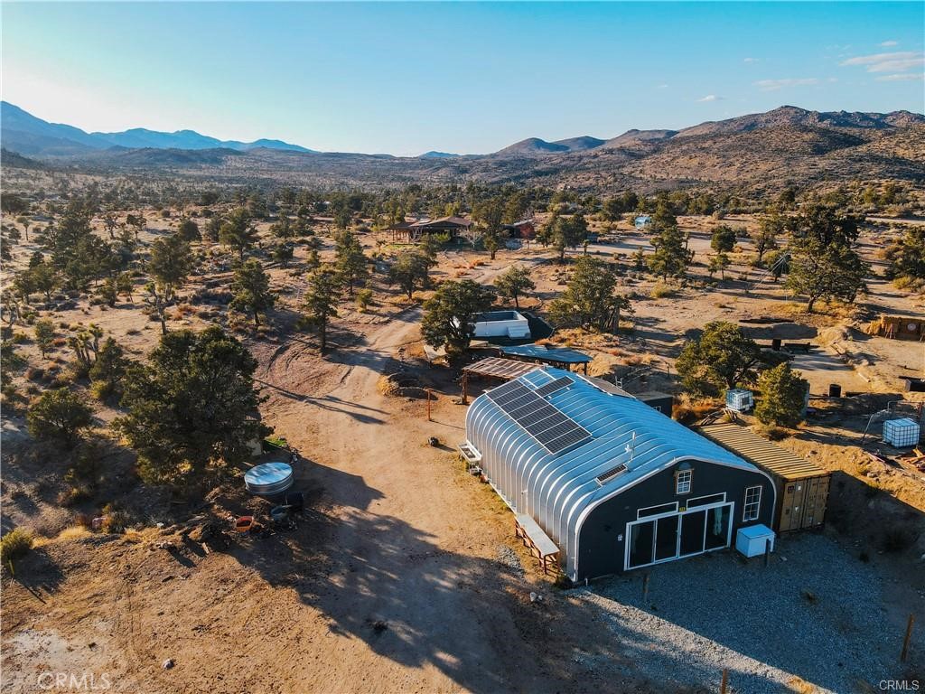 48317 Burns Canyon Road Pioneertown, CA 92268 - Photo 1 of 41 a view of a city with mountain