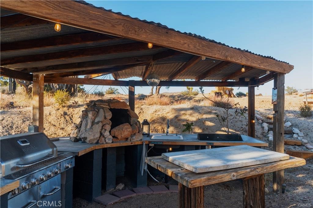 48317 Burns Canyon Road Pioneertown, CA 92268 - Photo 28 of 41 a view of a outdoor space with swimming pool