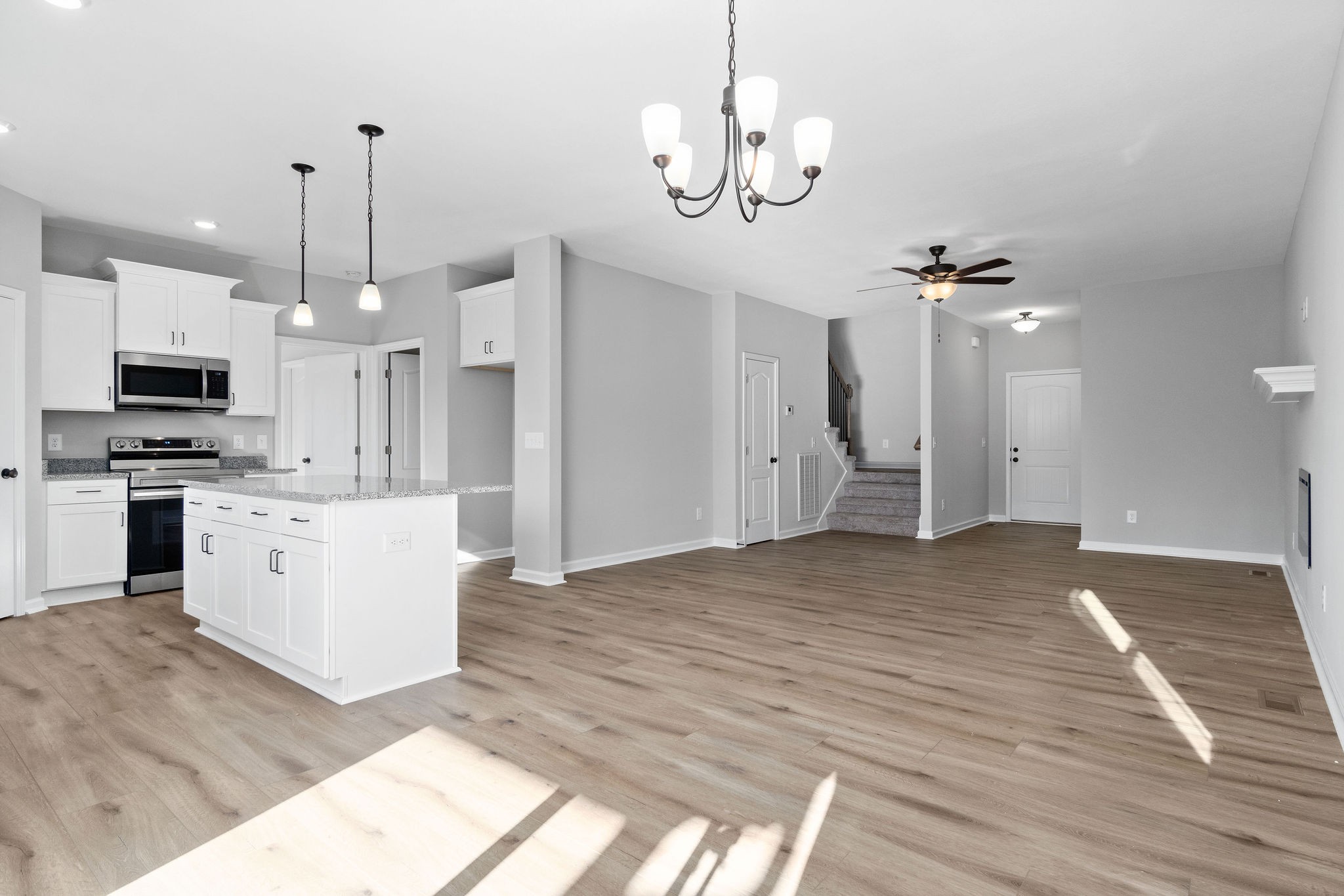 1042 Winesap Road Clarksville, TN 37040 - Photo 13 of 33 a view of an empty room and kitchen view