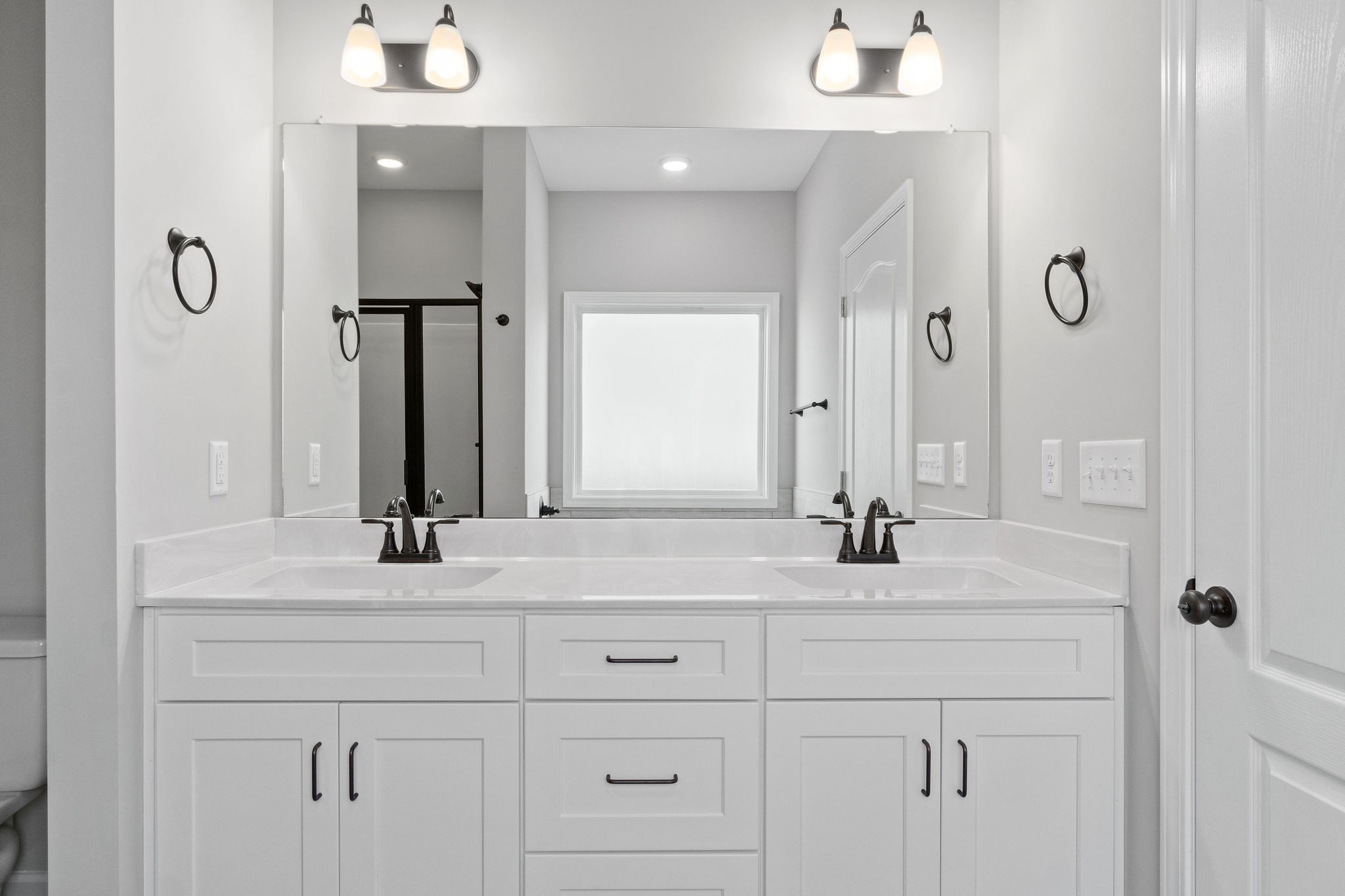 1042 Winesap Road Clarksville, TN 37040 - Photo 19 of 33 a bathroom with a sink and a mirror