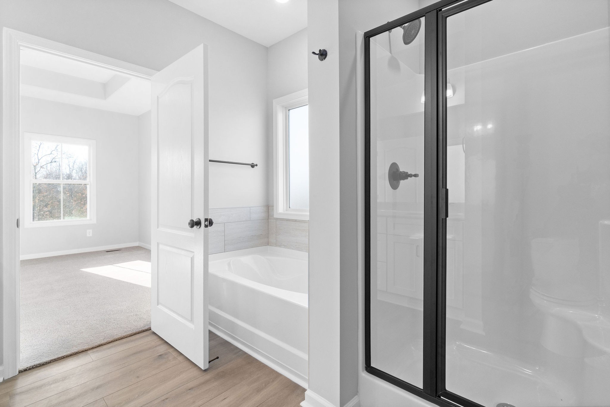 1042 Winesap Road Clarksville, TN 37040 - Photo 20 of 33 a bathroom with a bathtub and a shower