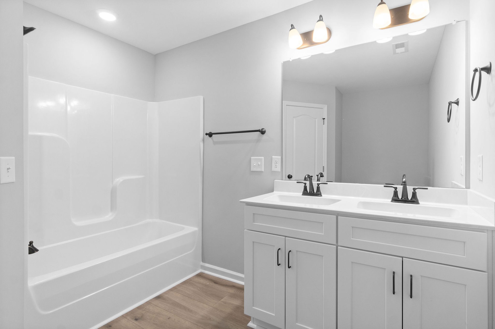 1042 Winesap Road Clarksville, TN 37040 - Photo 22 of 33 a bathroom with a sink a toilet and shower