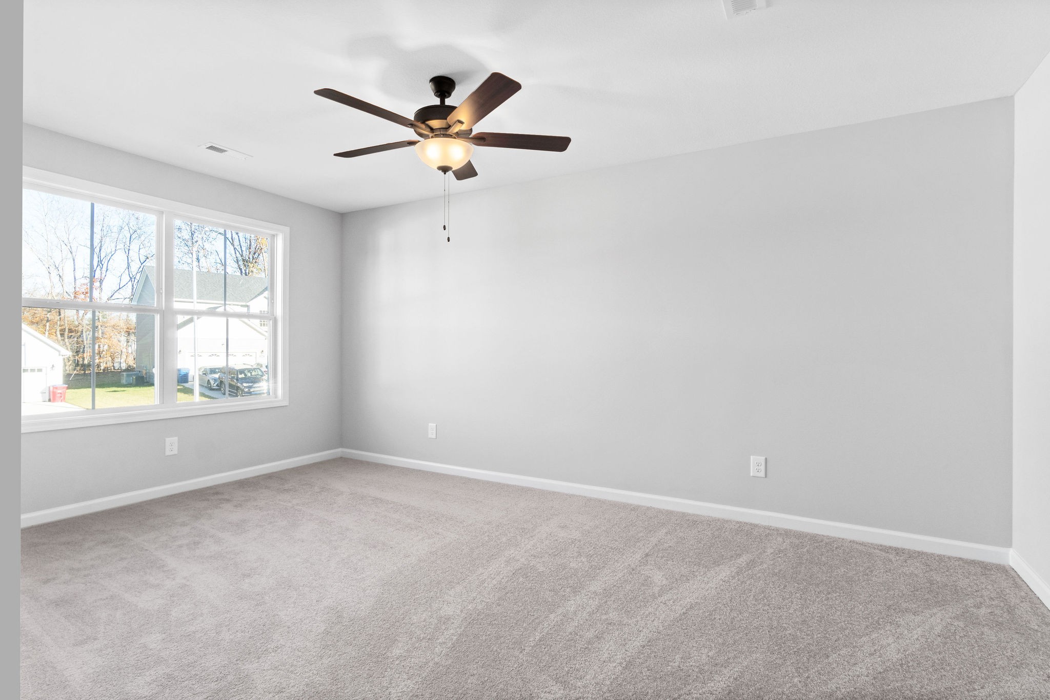 1042 Winesap Road Clarksville, TN 37040 - Photo 26 of 33 a view of a livingroom with a ceiling fan and window