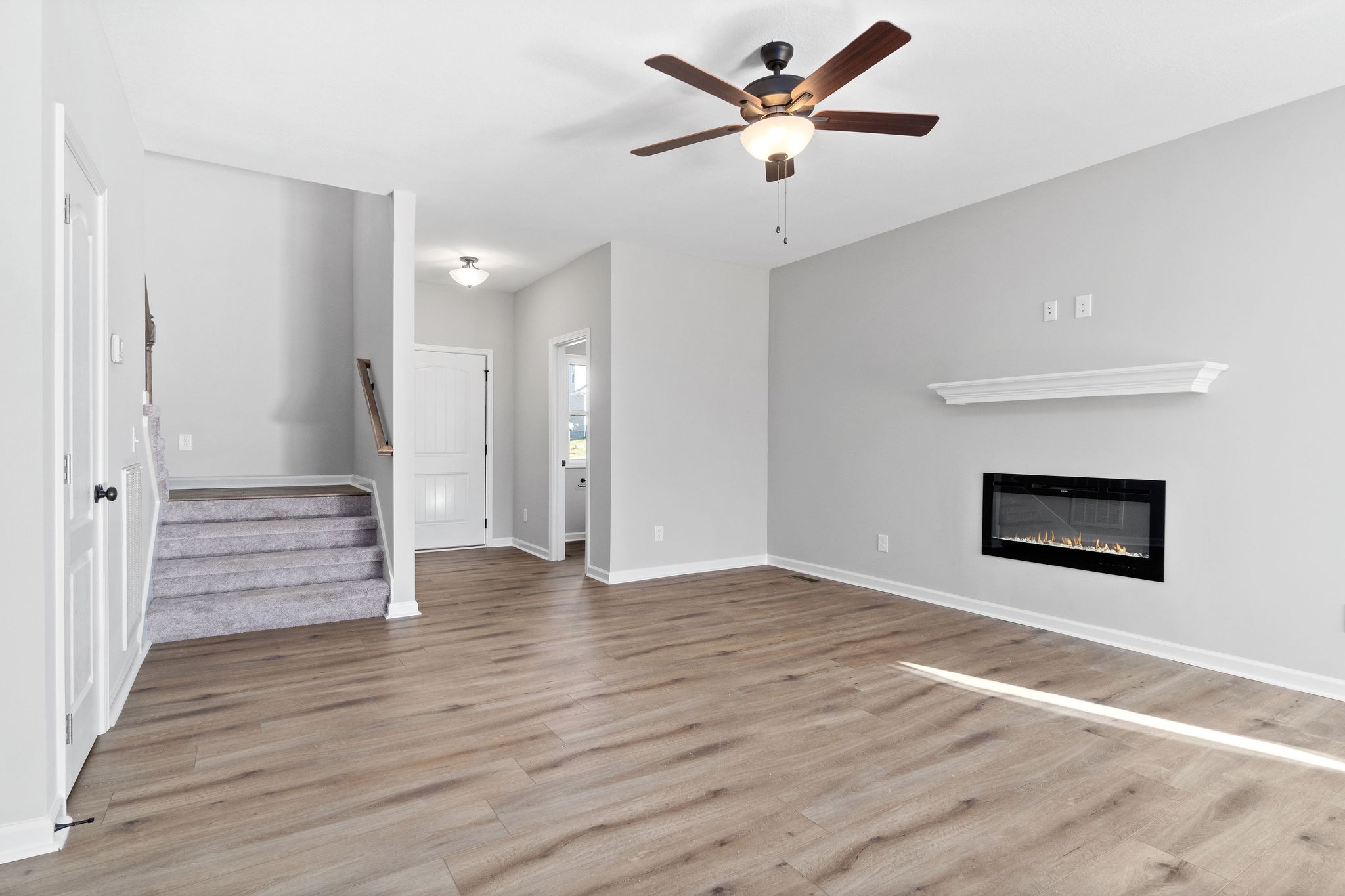 1042 Winesap Road Clarksville, TN 37040 - Photo 10 of 33 a view of an empty room and wooden floor