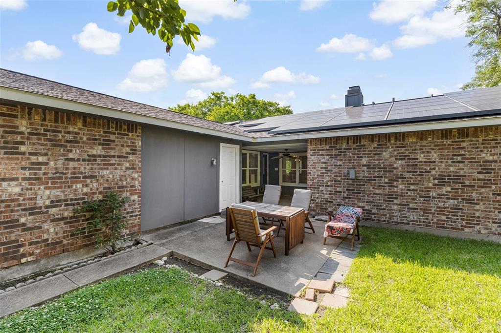 9212 Shipman Street Rowlett, TX 75088 - Photo 29 of 34 View of covered patio with ceiling fan and outdoor dining space