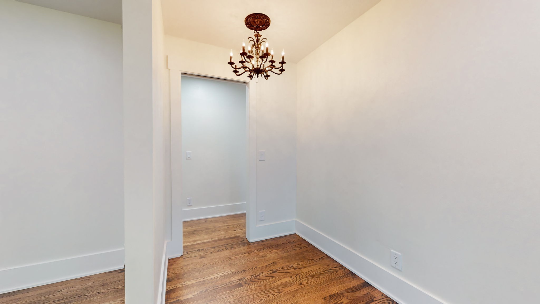196 Thomas Street Manchester, TN 37355 - Photo 12 of 43 a view of a chandelier in an empty room