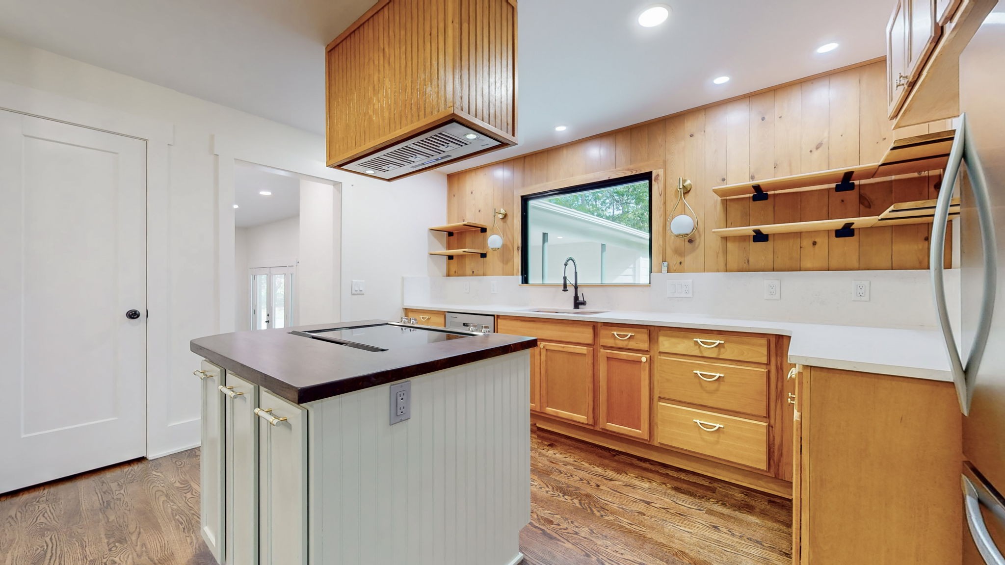 196 Thomas Street Manchester, TN 37355 - Photo 17 of 43 a kitchen with stainless steel appliances granite countertop a sink a stove and a refrigerator