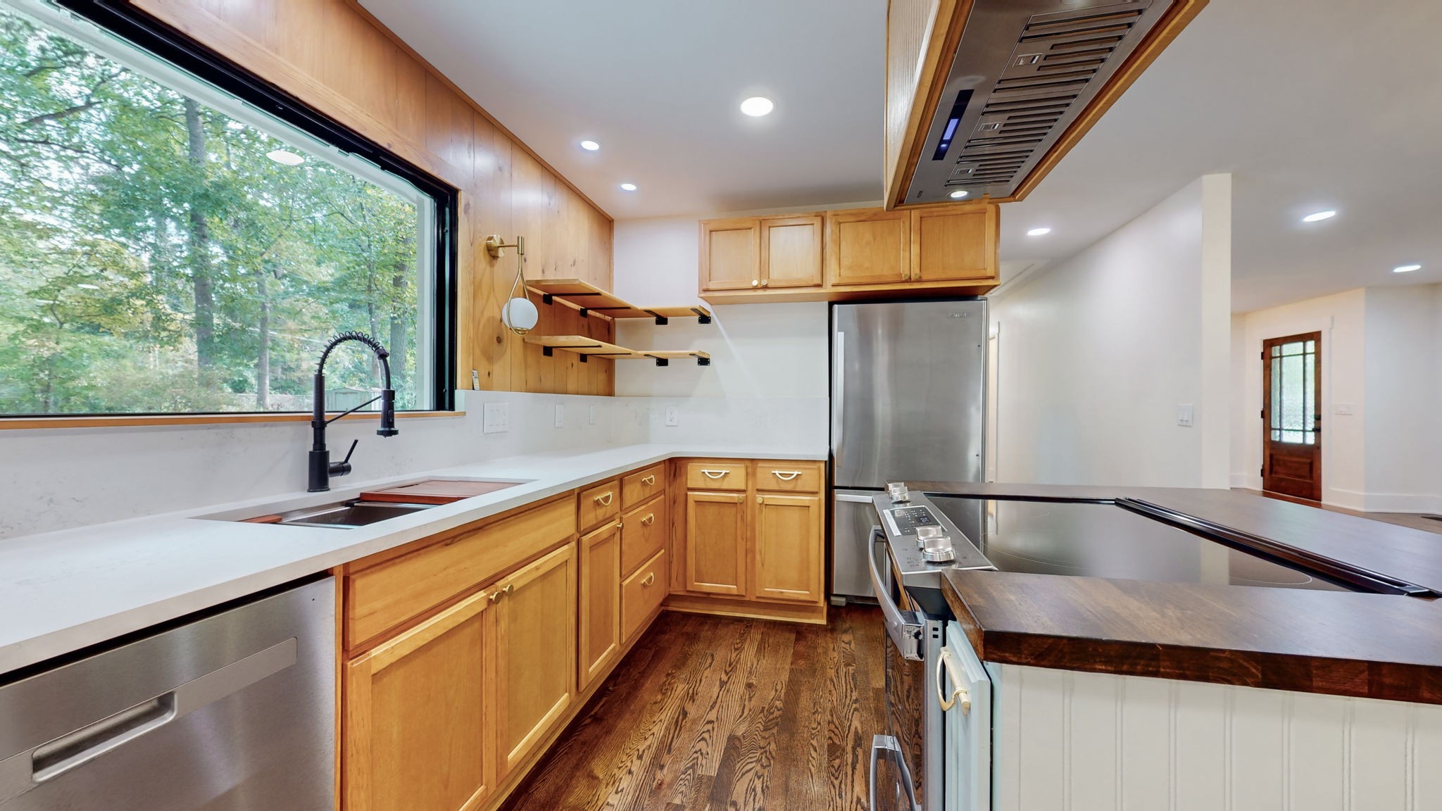 196 Thomas Street Manchester, TN 37355 - Photo 18 of 43 a kitchen with stainless steel appliances granite countertop a sink and a refrigerator