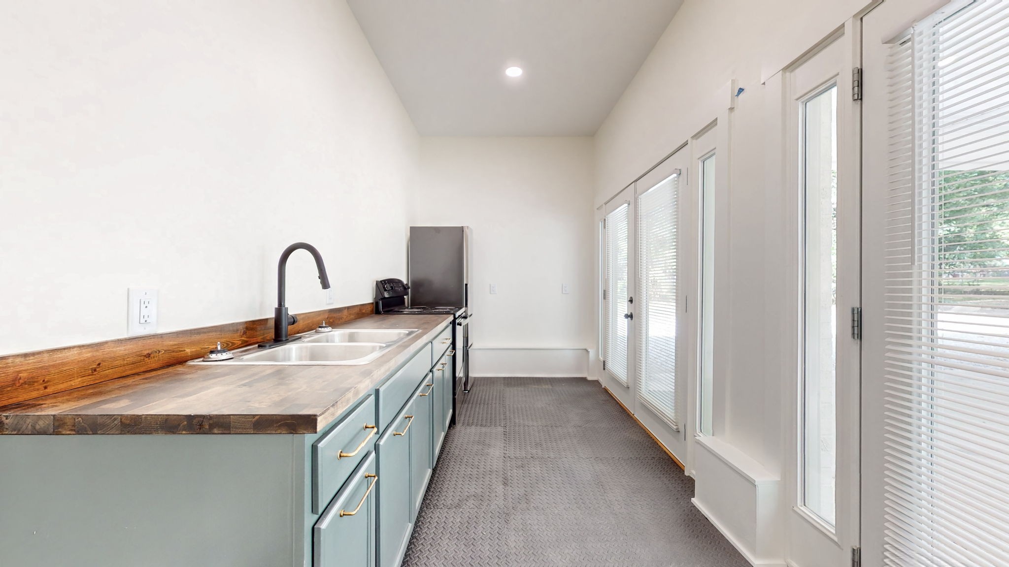 196 Thomas Street Manchester, TN 37355 - Photo 21 of 43 a kitchen with a sink and a window