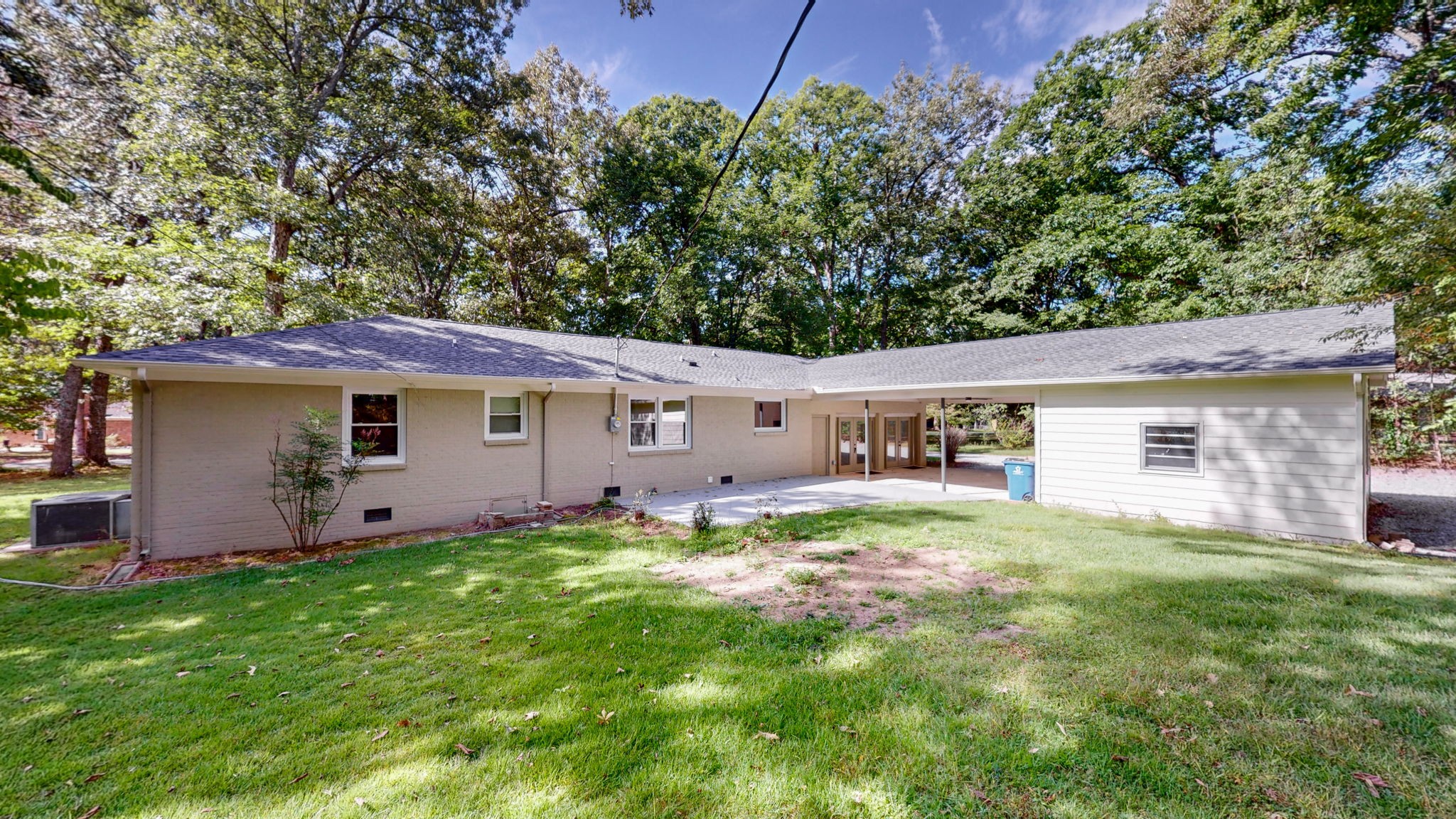 196 Thomas Street Manchester, TN 37355 - Photo 8 of 43 a backyard of a house with table and chairs
