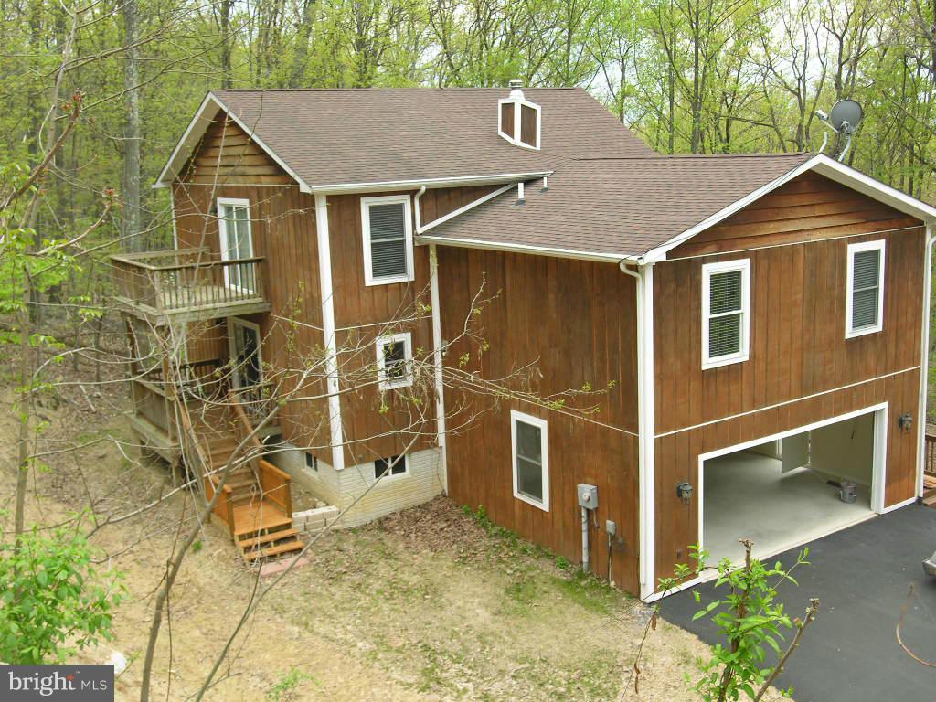 849 Valley View Road Harpers Ferry, WV 25425 - Photo 2 of 29 a view of a brick house with large windows