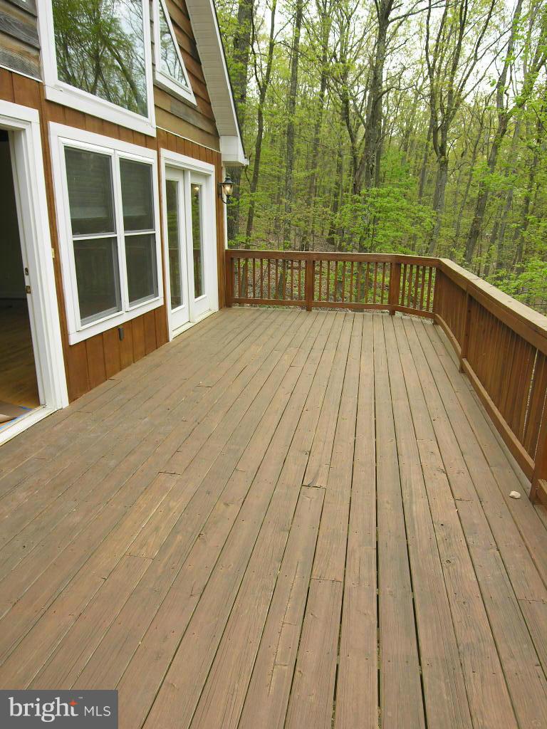 849 Valley View Road Harpers Ferry, WV 25425 - Photo 24 of 29 a view of balcony with wooden floor and fence
