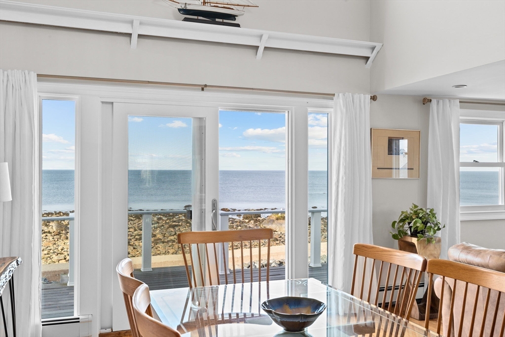 45 Rebecca Road Scituate, MA 02066 - Photo 12 of 36 a view of a dining room with furniture window and wooden floor