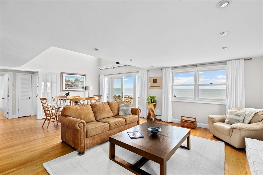 45 Rebecca Road Scituate, MA 02066 - Photo 19 of 36 a living room with furniture and a large window