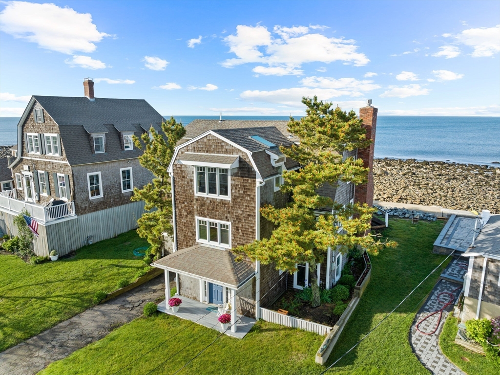 45 Rebecca Road Scituate, MA 02066 - Photo 2 of 36 front view of a house with a garden