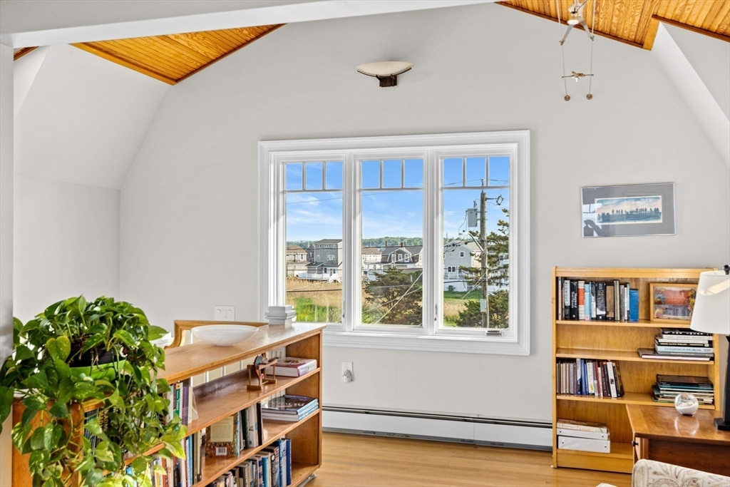 45 Rebecca Road Scituate, MA 02066 - Photo 21 of 36 a living room with furniture and a window