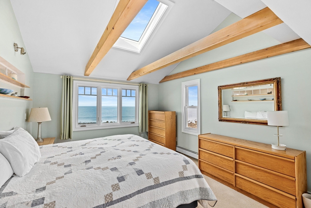 45 Rebecca Road Scituate, MA 02066 - Photo 23 of 36 a bedroom with a bed and a dresser