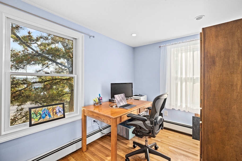 45 Rebecca Road Scituate, MA 02066 - Photo 28 of 36 a view of a workspace with furniture and a window