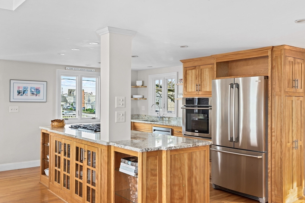 45 Rebecca Road Scituate, MA 02066 - Photo 6 of 36 a kitchen with stainless steel appliances granite countertop a refrigerator and a sink