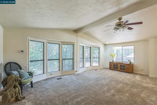 a kitchen with granite countertop lots of counter top space and dining table