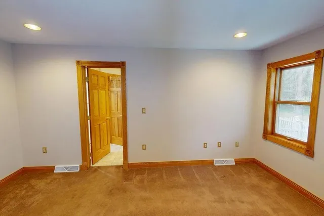 an empty room with window