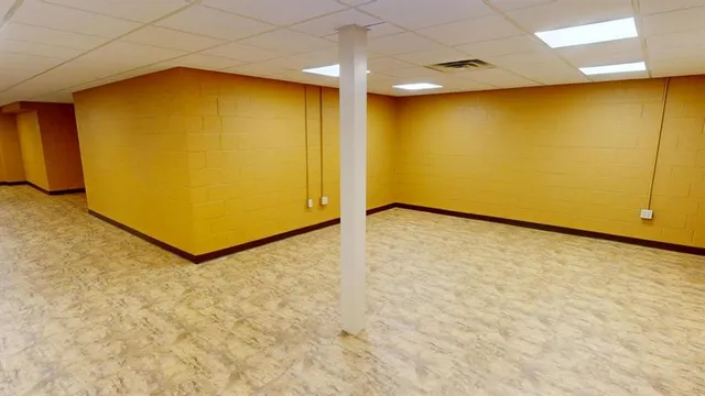 an empty room with a natural light