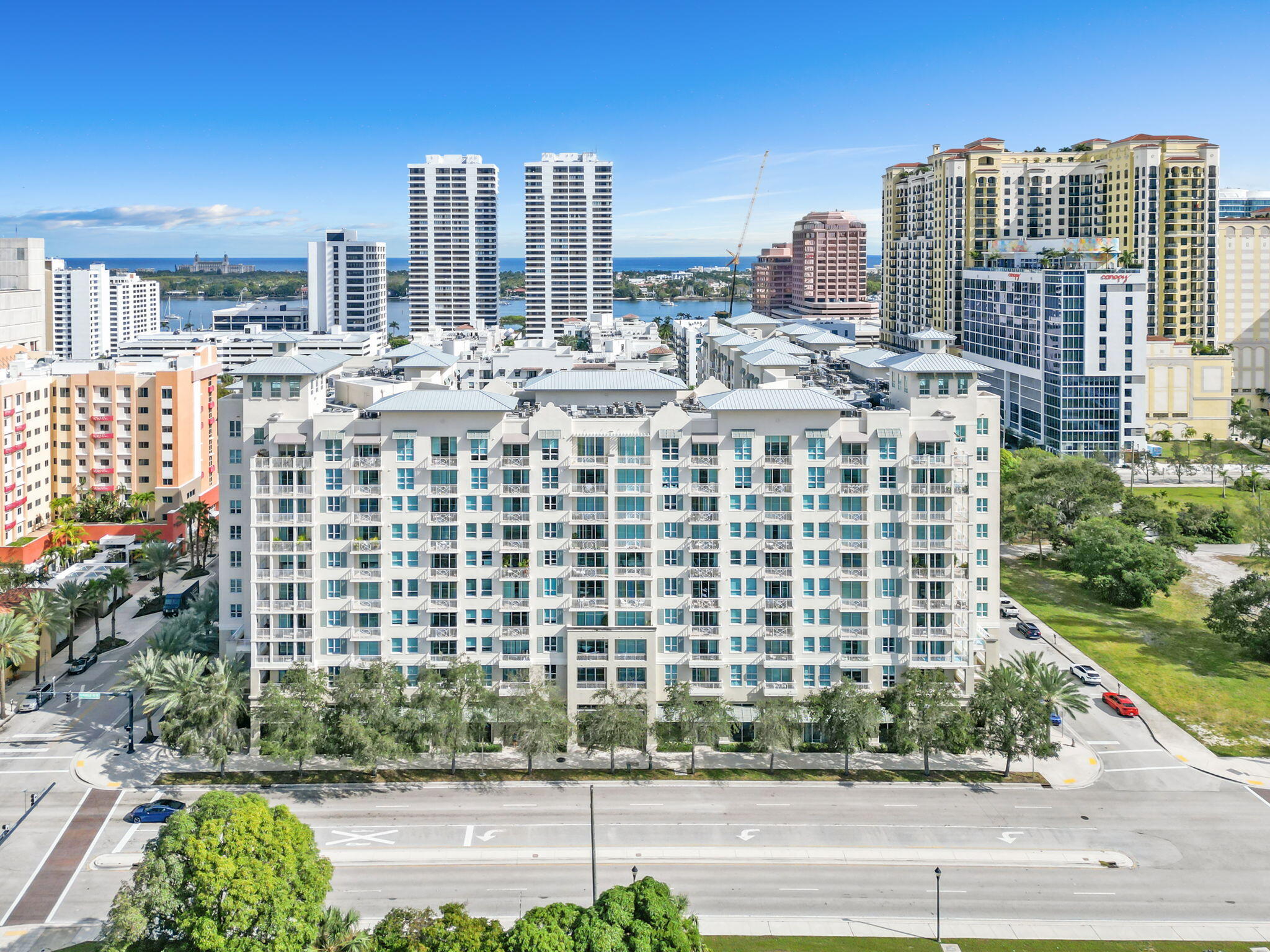 480 Hibiscus Street, Unit 601 West Palm Beach, FL 33401 - Photo 1 of 40 a front view of a building with garden