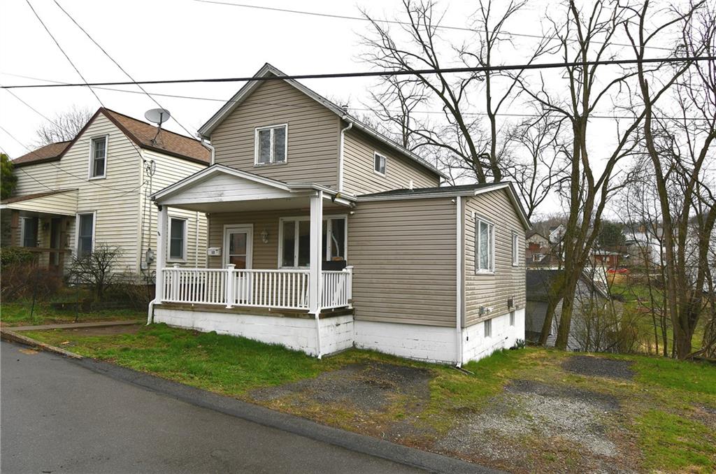 17 Dean Street Carnegie, PA 15106 - Photo 1 of 23 a front view of a house with a yard