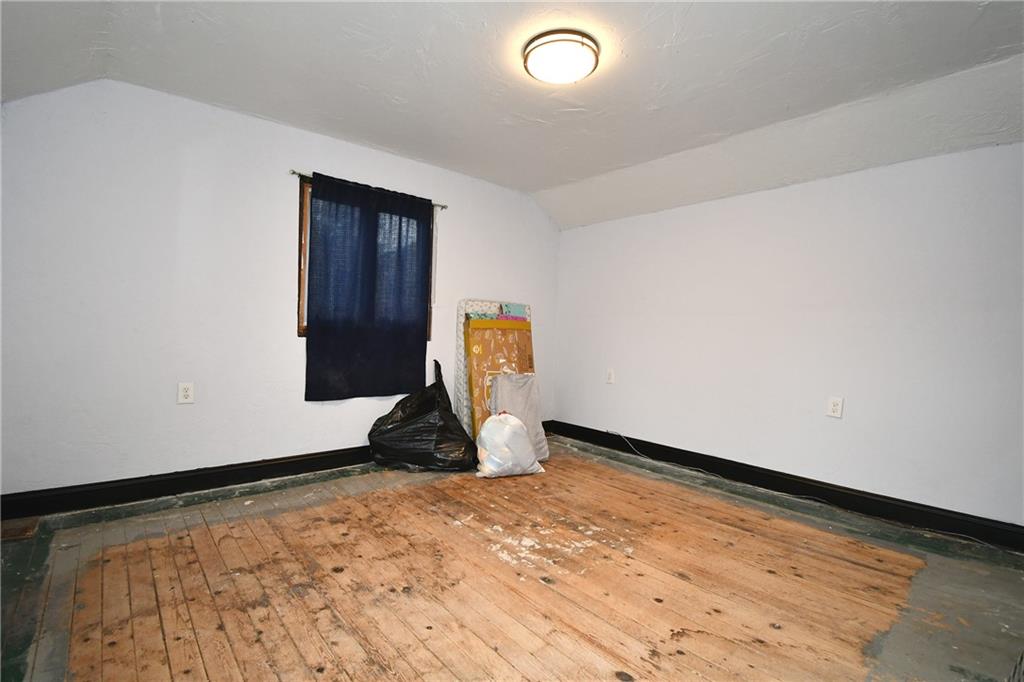 17 Dean Street Carnegie, PA 15106 - Photo 11 of 23 a view of empty room with wooden floor