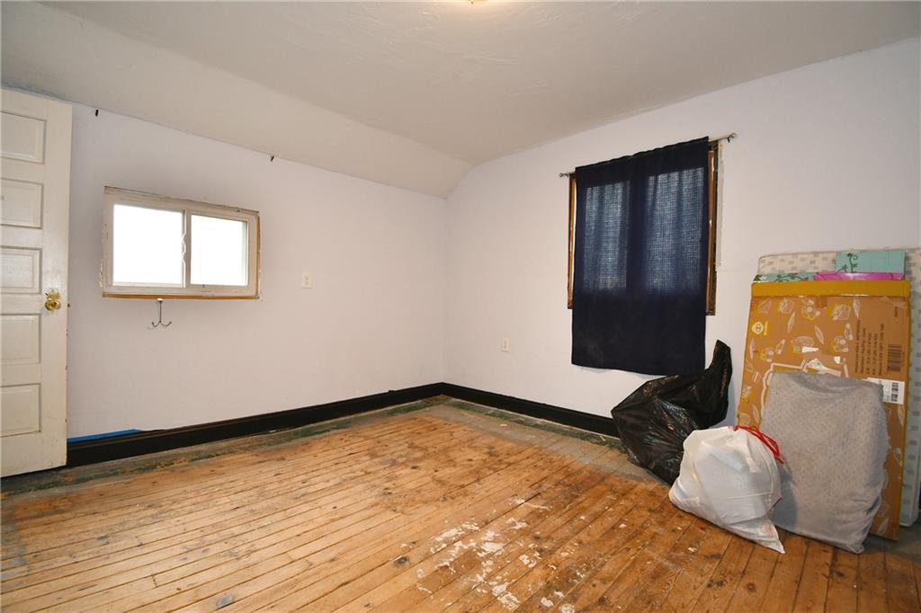 17 Dean Street Carnegie, PA 15106 - Photo 12 of 23 a view of an empty room with wooden floor and closet