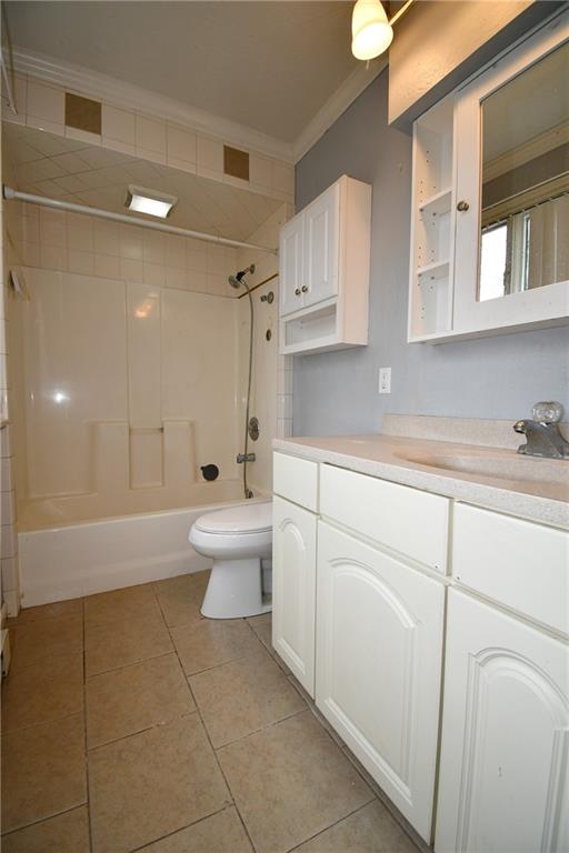 17 Dean Street Carnegie, PA 15106 - Photo 15 of 23 a bathroom with a sink a toilet and shower