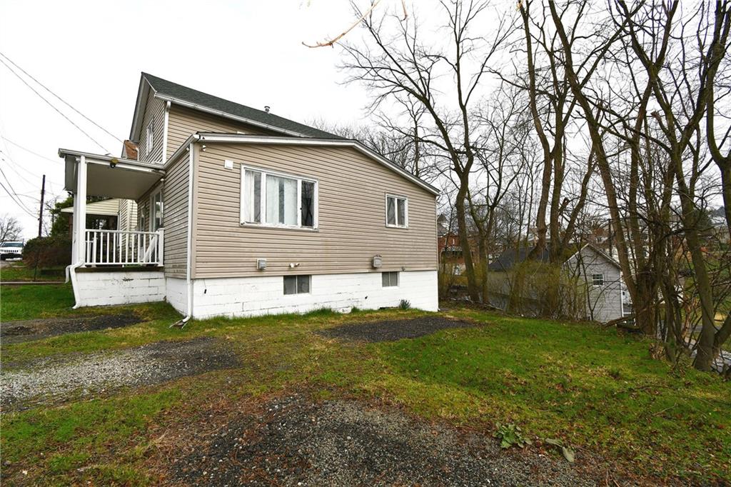 17 Dean Street Carnegie, PA 15106 - Photo 20 of 23 a house view with a garden space