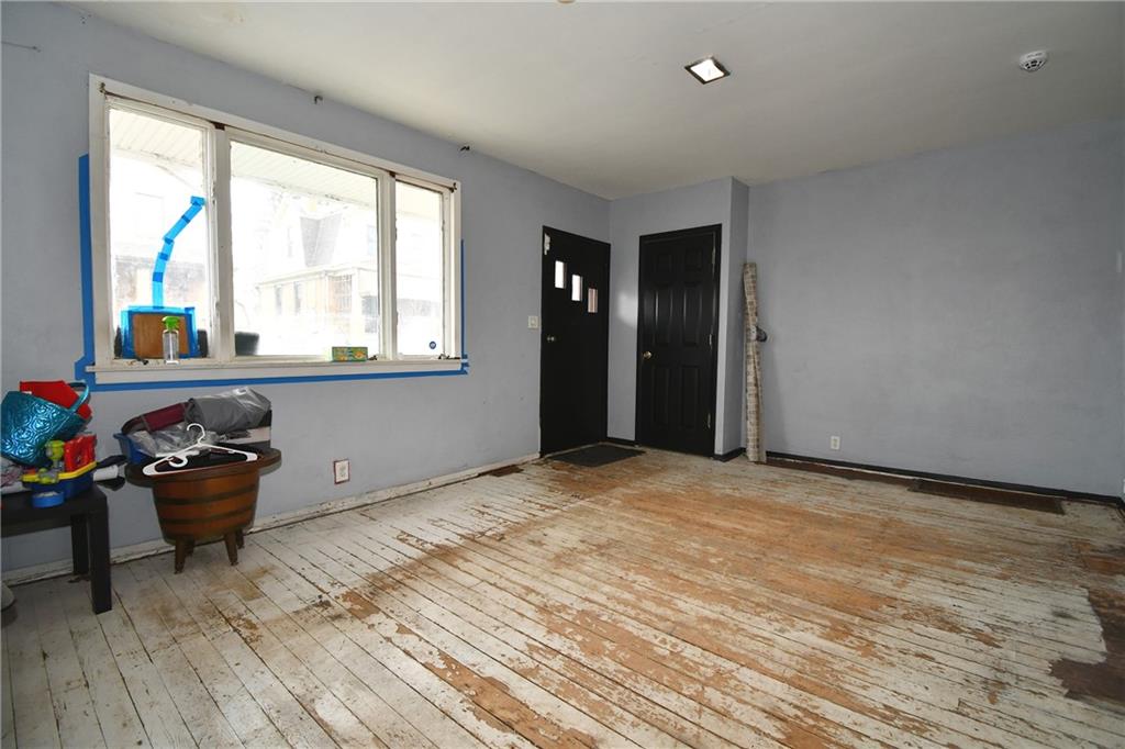 17 Dean Street Carnegie, PA 15106 - Photo 6 of 23 a view of a room with wooden floor and furniture