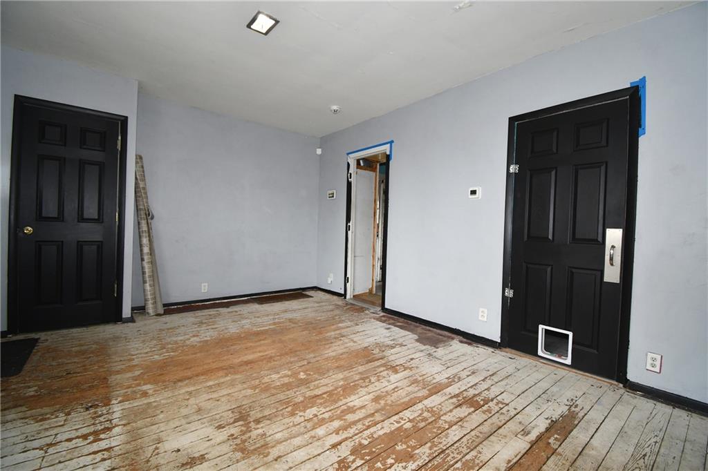 17 Dean Street Carnegie, PA 15106 - Photo 7 of 23 a view of an empty room with wooden floor and closet