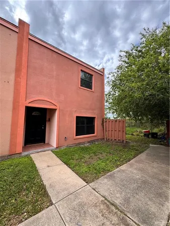a front view of house with yard