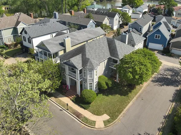an aerial view of a house with a garden