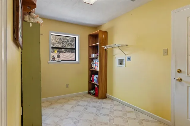 a bathroom with a tub and a shower