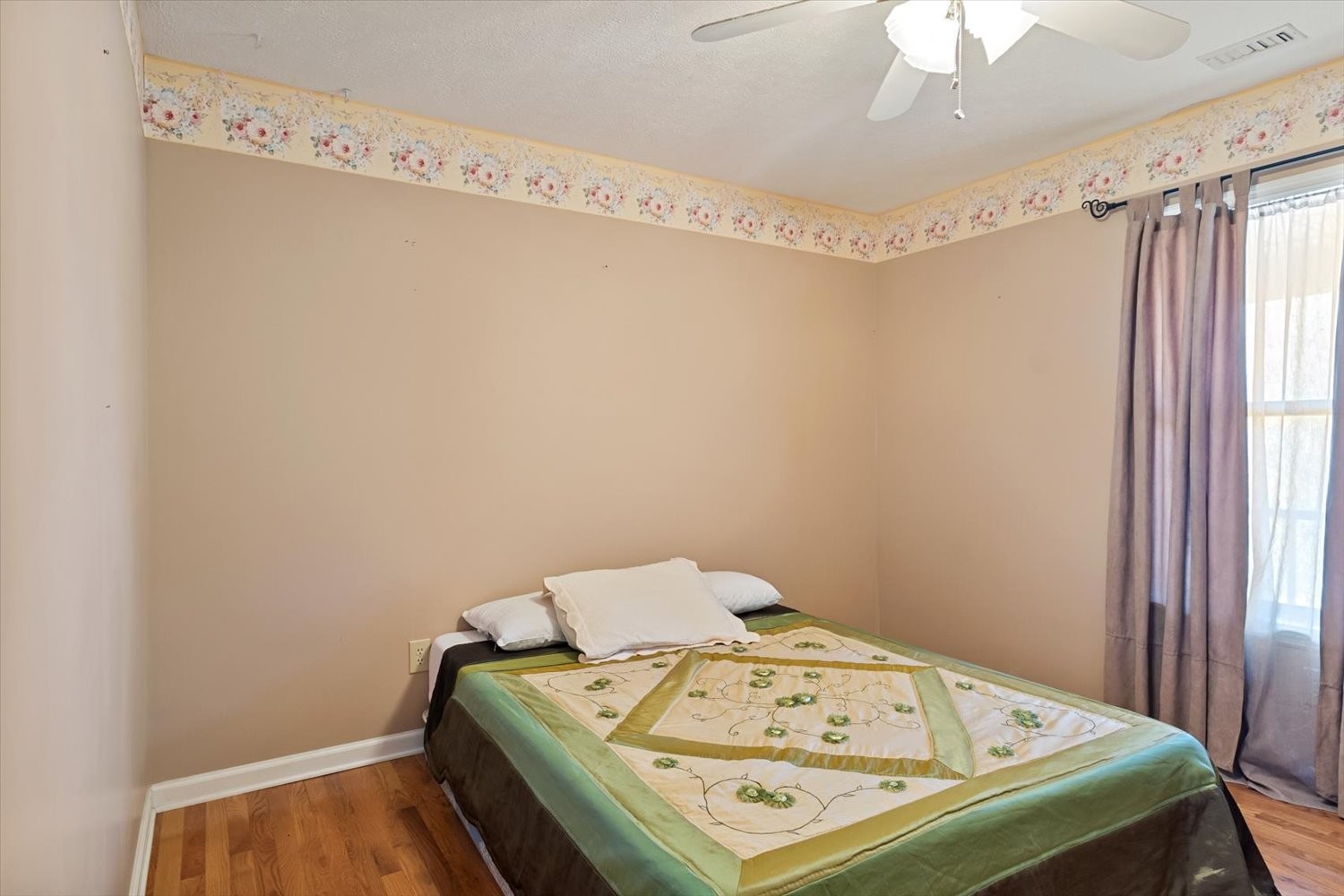 3885 Delina Road Cornersville, TN 37047 - Photo 26 of 67 a bedroom with a bed and a window in it