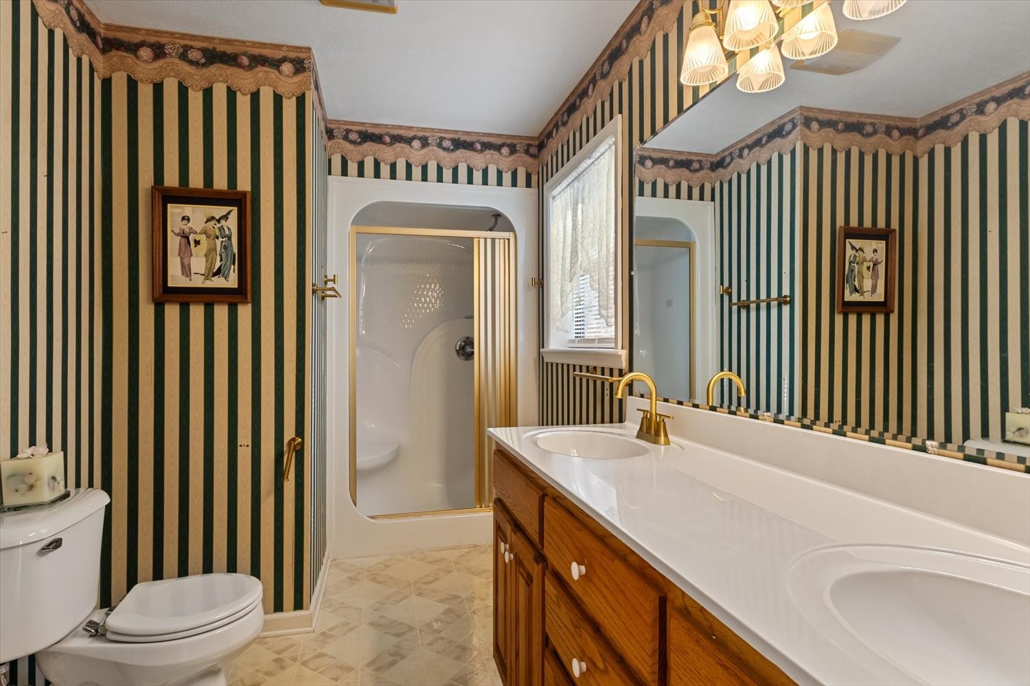 3885 Delina Road Cornersville, TN 37047 - Photo 28 of 67 a bathroom with a sink a toilet and shower