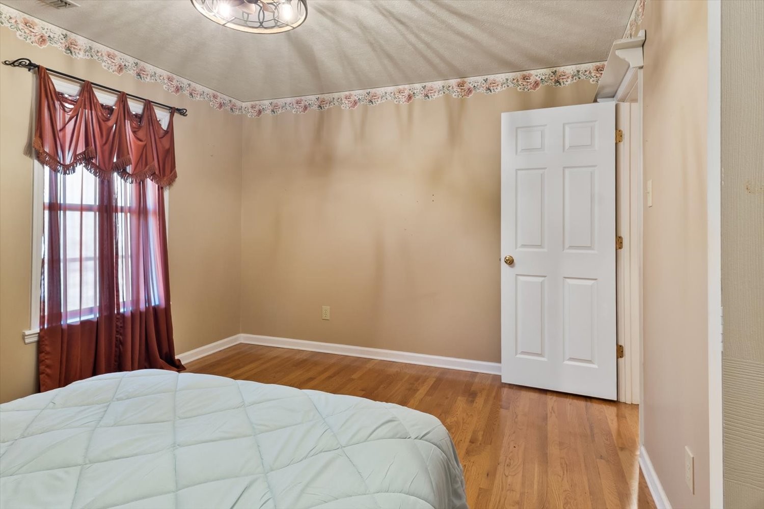 3885 Delina Road Cornersville, TN 37047 - Photo 30 of 67 a bedroom with a bed and a window