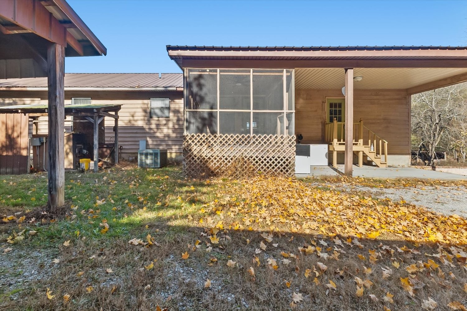 3885 Delina Road Cornersville, TN 37047 - Photo 33 of 67 a front view of a house with garden