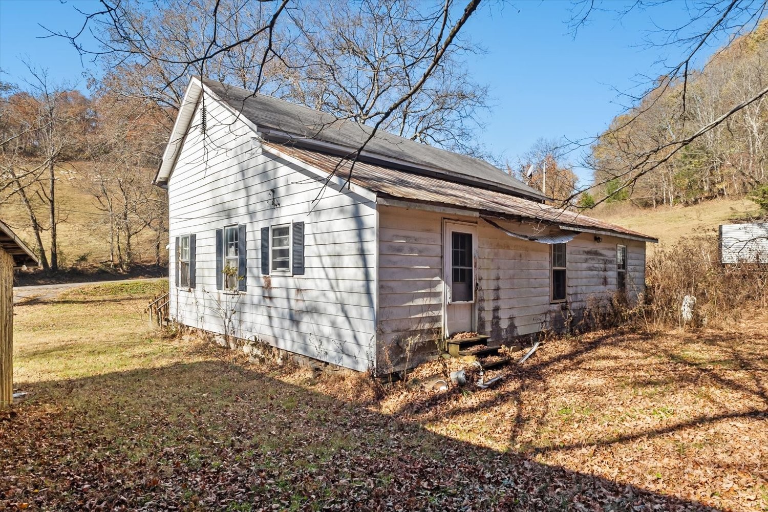 3885 Delina Road Cornersville, TN 37047 - Photo 54 of 67 a view of a house with a yard
