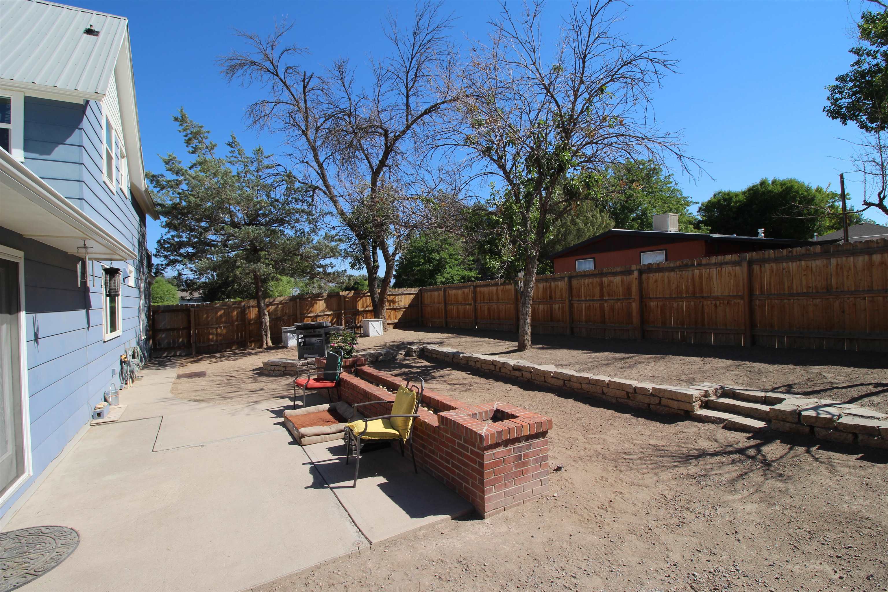 1150 East 7th Street Delta, CO 81416 - Photo 24 of 32 a view of backyard with hardwood and outdoor seating