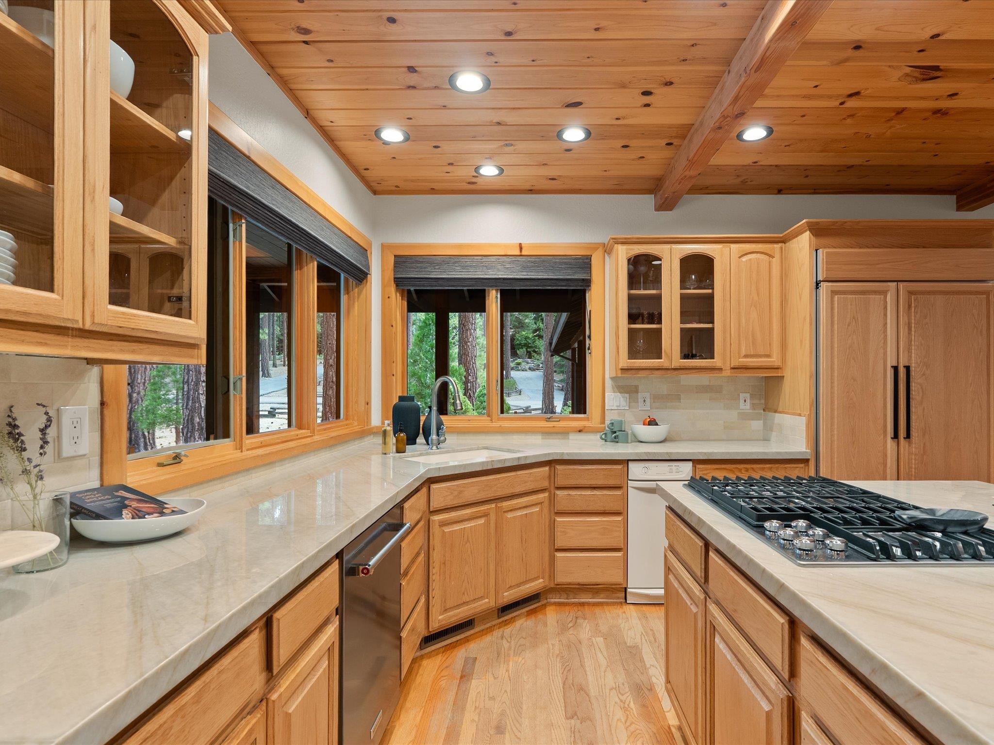 355 Quail View Circle Clio, CA 96106 - Photo 20 of 48 a kitchen with a sink stove and cabinets