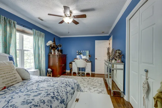 a view of a two chairs in the balcony