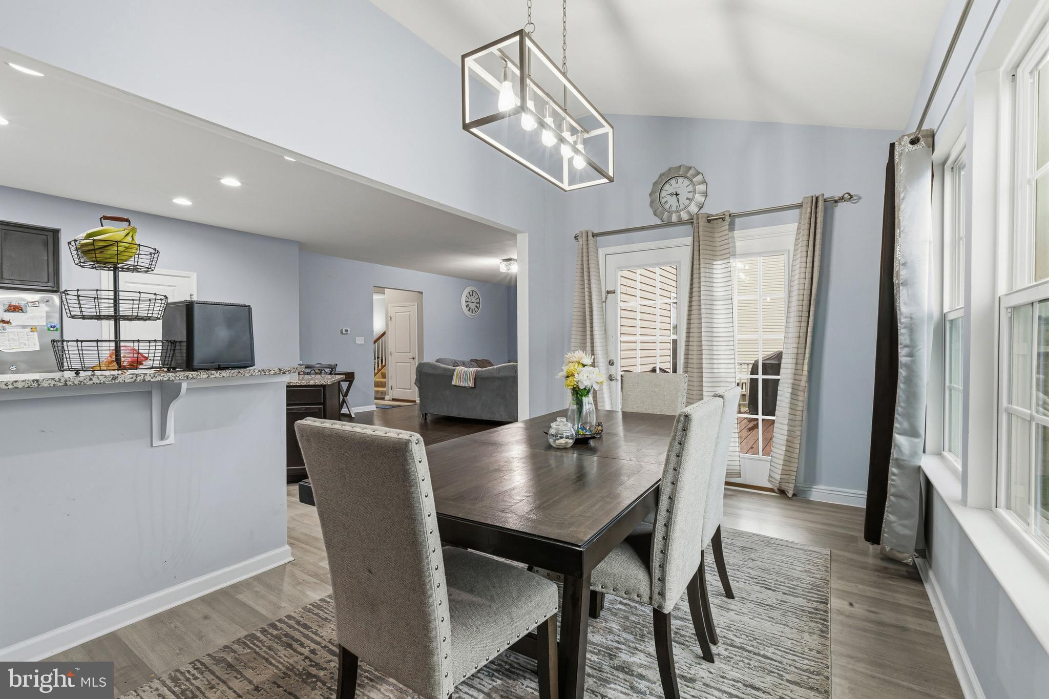 28 Snow Branch Road Clayton, DE 19938 - Photo 22 of 69 a view of a dining room with furniture window and wooden floor
