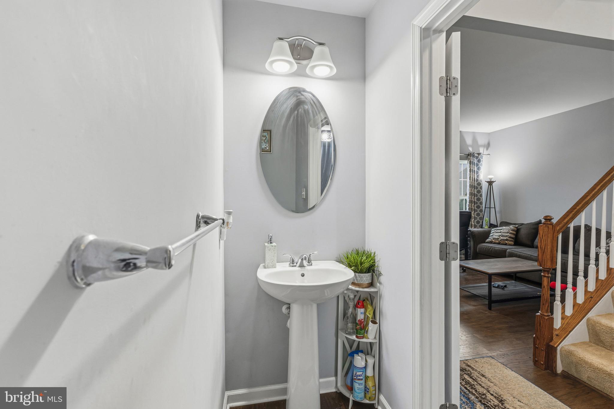28 Snow Branch Road Clayton, DE 19938 - Photo 25 of 69 a bathroom with a sink and a mirror